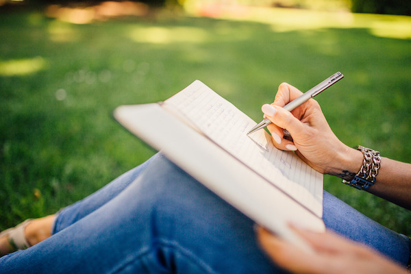 Write - woman writing in journal